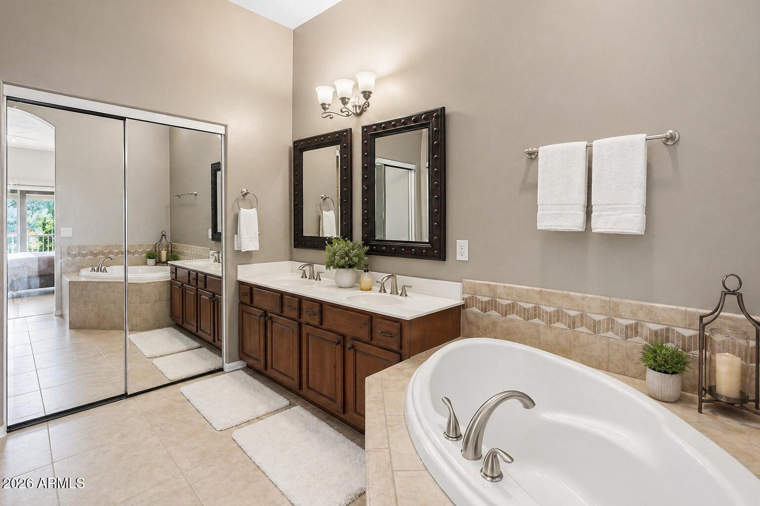 6202 East McKellips Road, Unit 11 Mesa, AZ 85215 - Photo 14 of 21 a bathroom with a double vanity sink mirror and