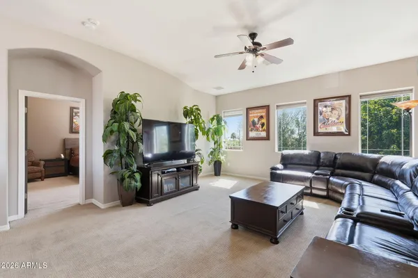 a view of a backyard with sitting area