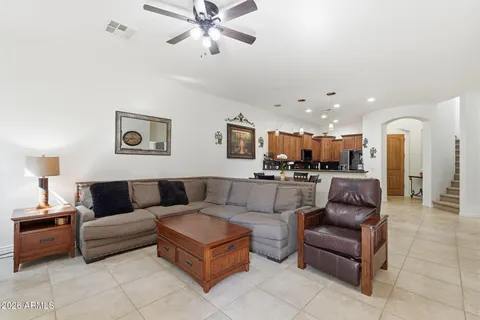 a kitchen with stainless steel appliances a stove sink microwave and cabinets