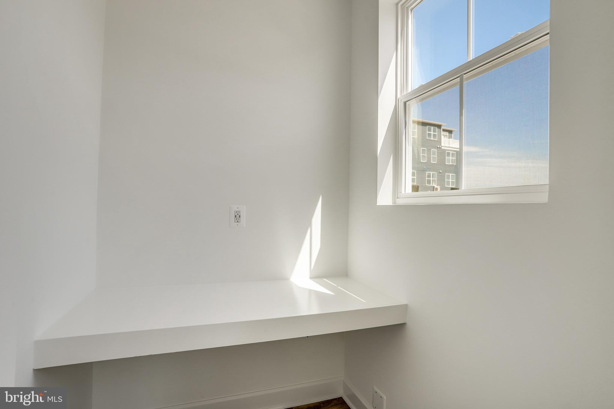 1811 Shookstown Road Frederick, MD 21702 - Photo 17 of 37 a view of an empty room with a window