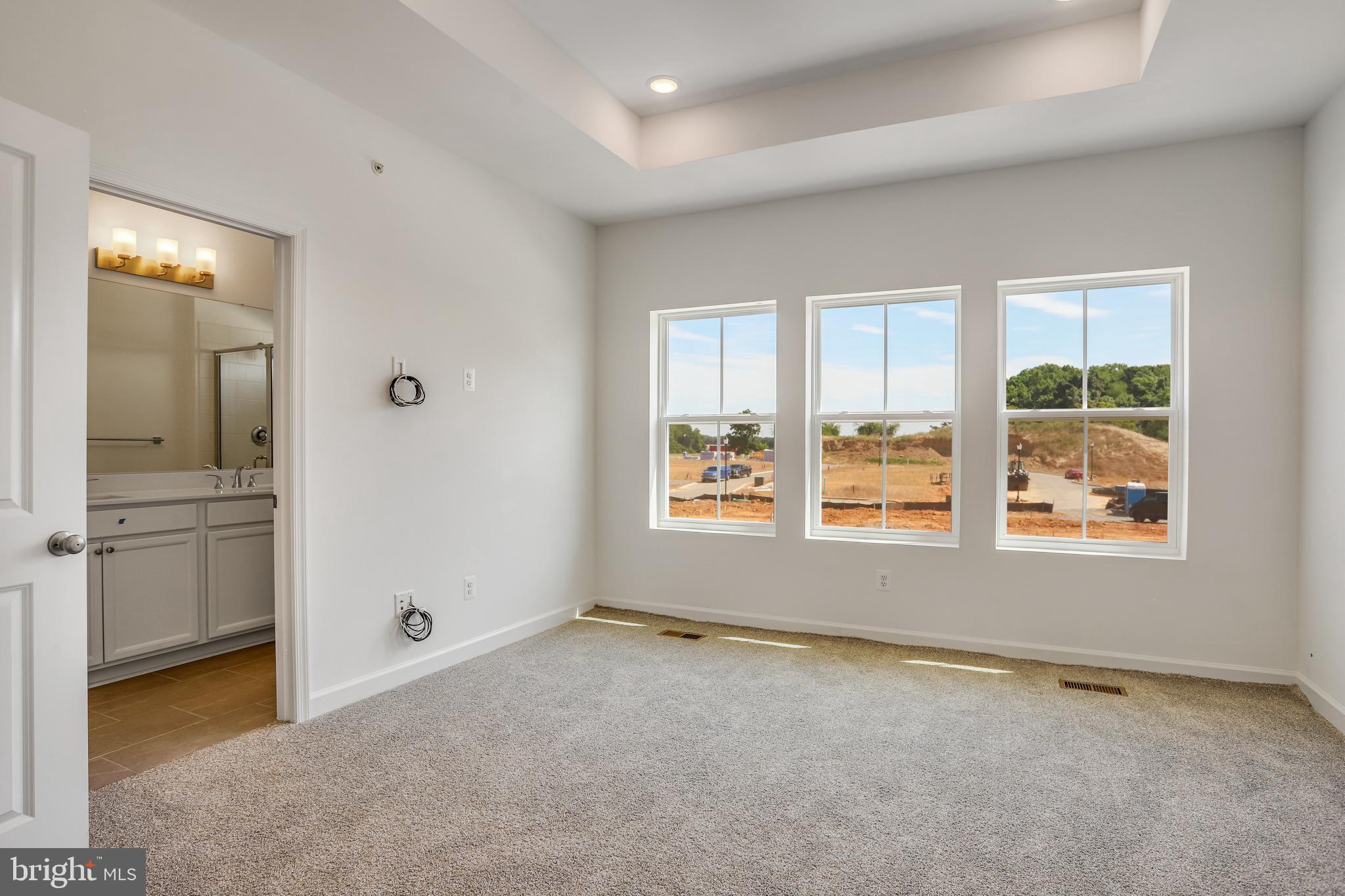 1811 Shookstown Road Frederick, MD 21702 - Photo 22 of 37 an empty room with windows and closet