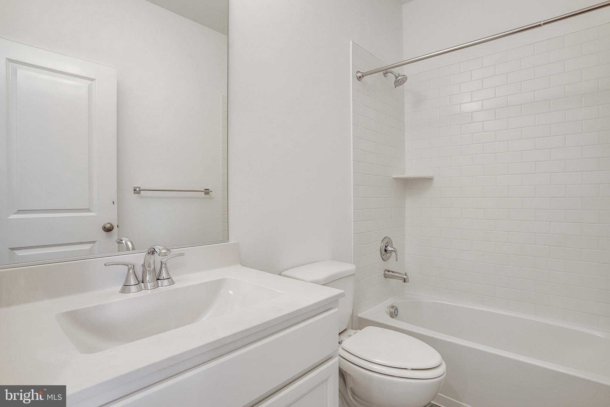 1811 Shookstown Road Frederick, MD 21702 - Photo 28 of 37 a bathroom with a sink toilet and shower