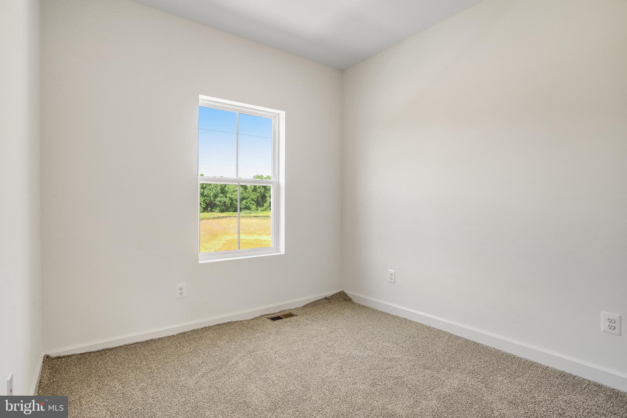1811 Shookstown Road Frederick, MD 21702 - Photo 32 of 37 an empty room with a window