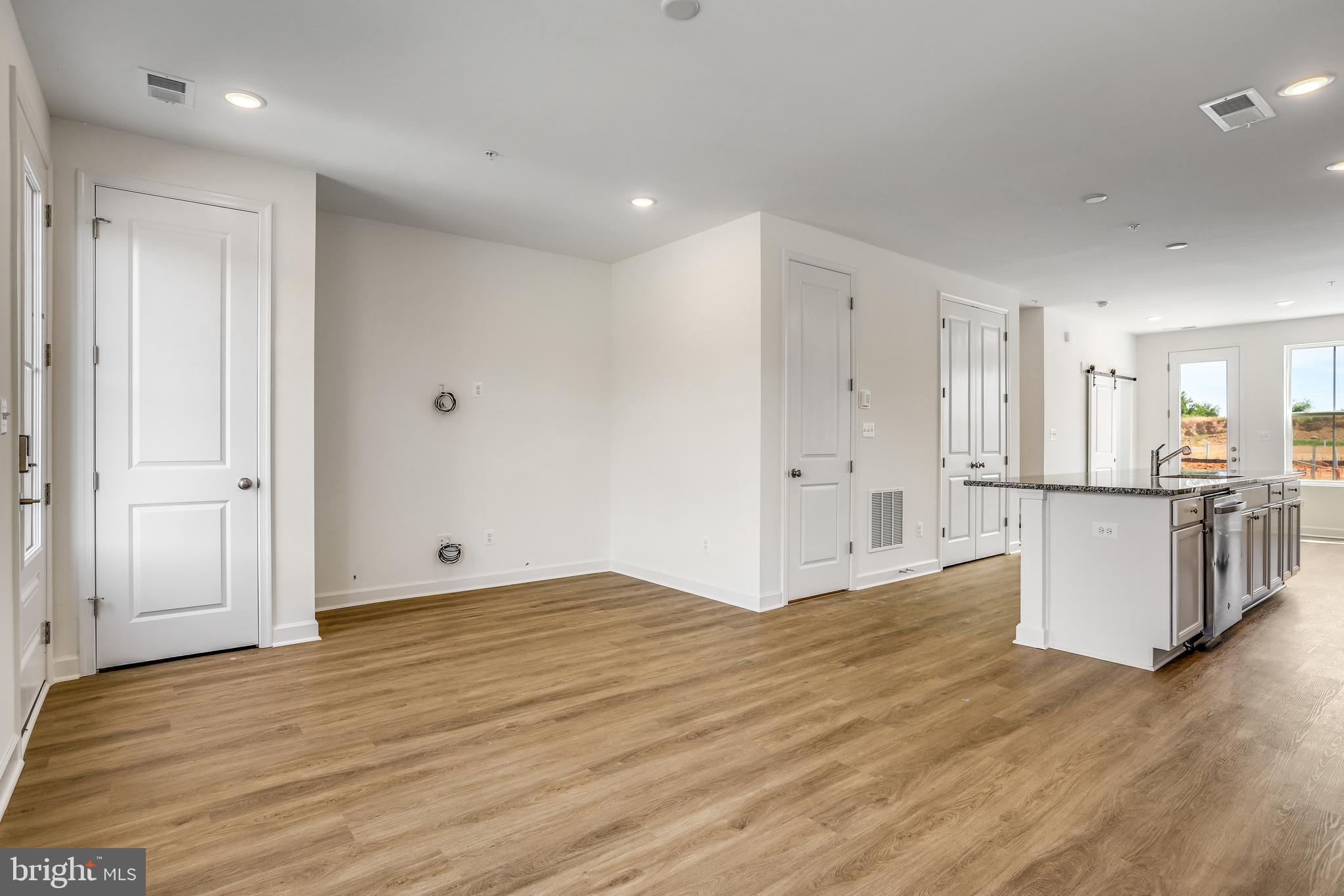 1811 Shookstown Road Frederick, MD 21702 - Photo 7 of 37 a view of kitchen with wooden floor
