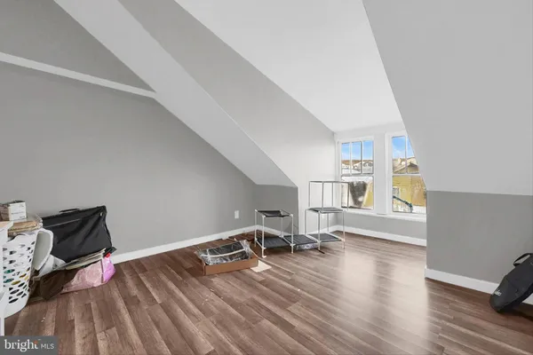 a view of livingroom with furniture and wooden floor