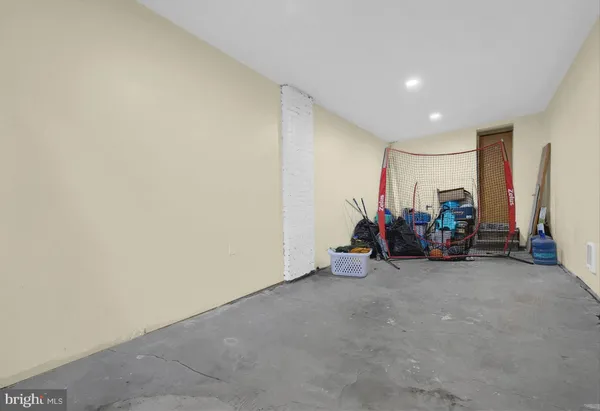 a view of a room with a large window