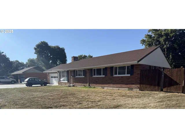a view of balcony with wooden floor