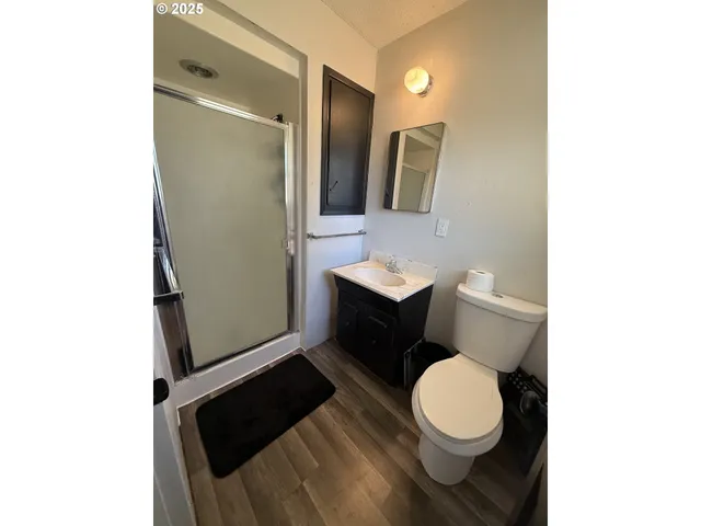 a bathroom with a toilet and a sink