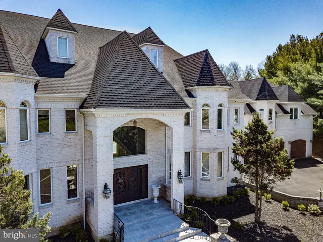 a front view of a house with yard