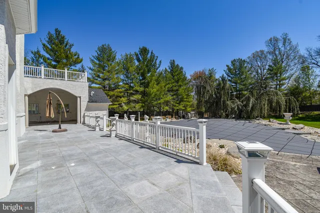 a view of a street with a building in the background
