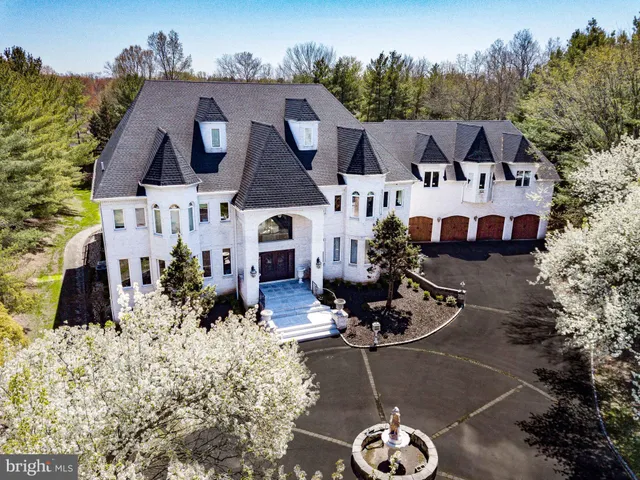 an aerial view of a house with garden space