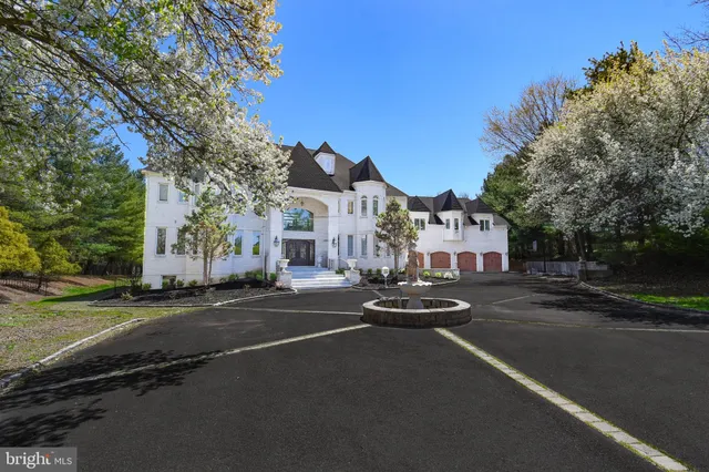 a city street lined with buildings and trees