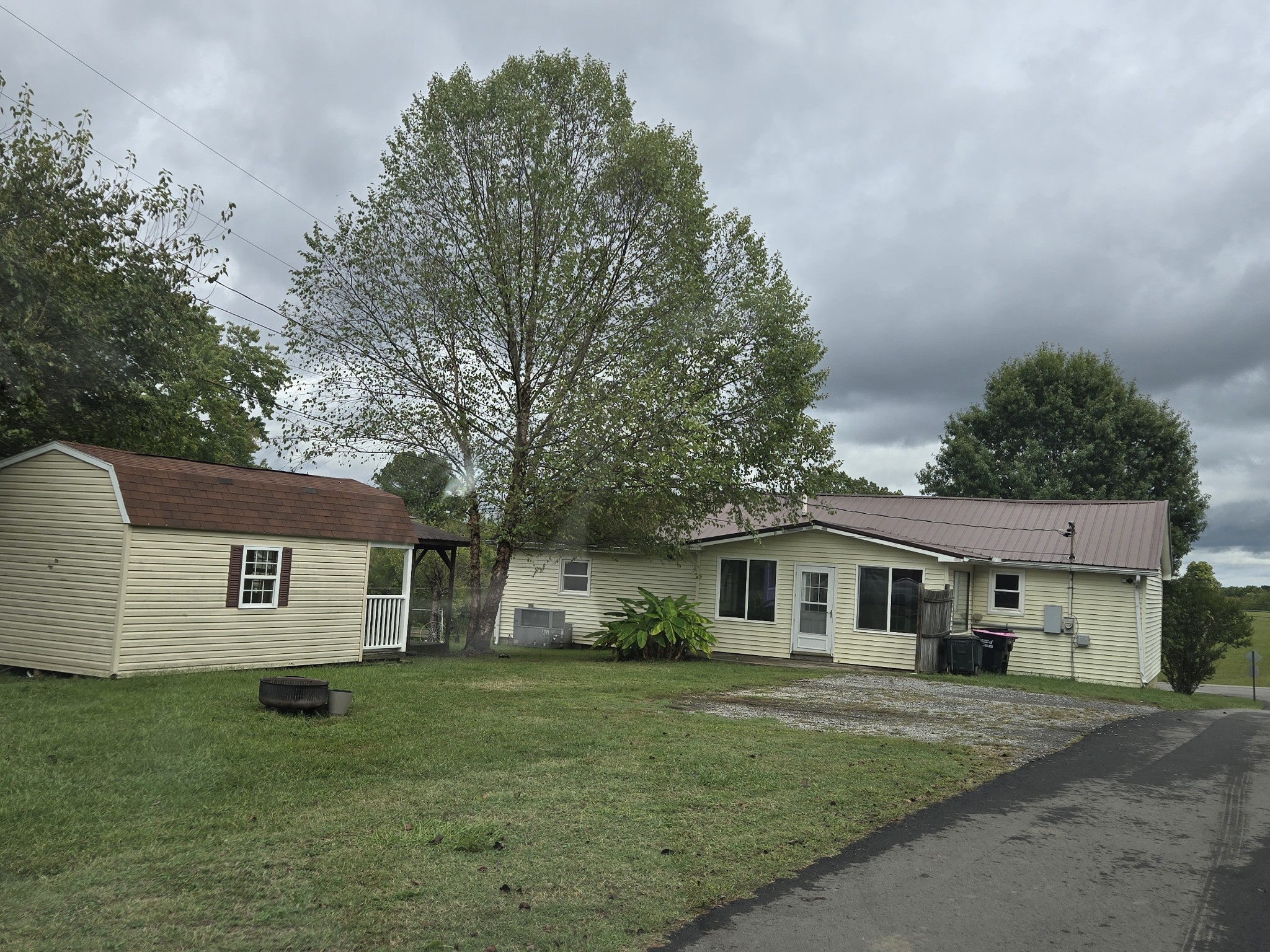 4671 Talley Road Springfield, TN 37172 - Photo 19 of 19 a front view of a house with a garden