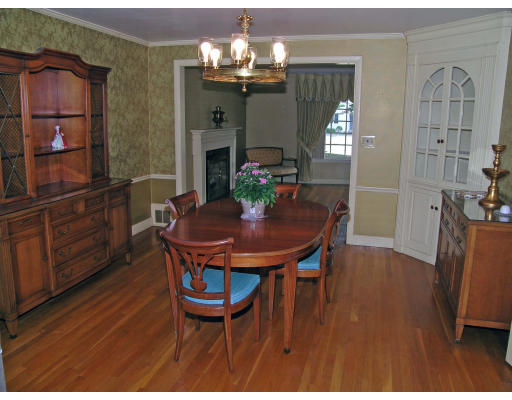 41 Woodfall Road Belmont, MA 02478 - Photo 5 of 8 a view of a dining room with furniture and wooden floor
