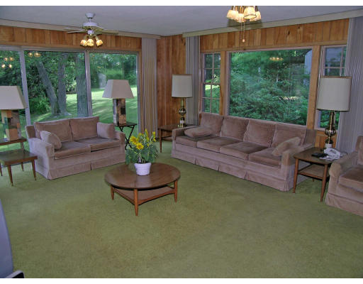 41 Woodfall Road Belmont, MA 02478 - Photo 6 of 8 a living room with furniture and a large window