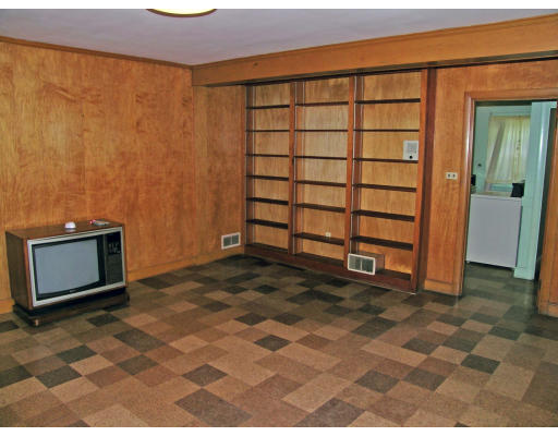 41 Woodfall Road Belmont, MA 02478 - Photo 8 of 8 a view of a room with a door and a wooden floor