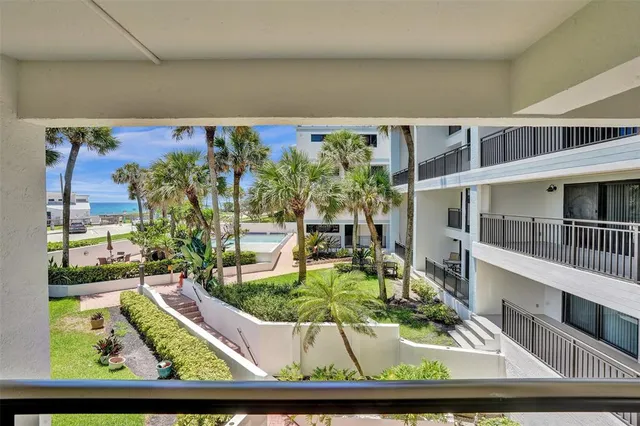 a view of swimming pool with a seating space