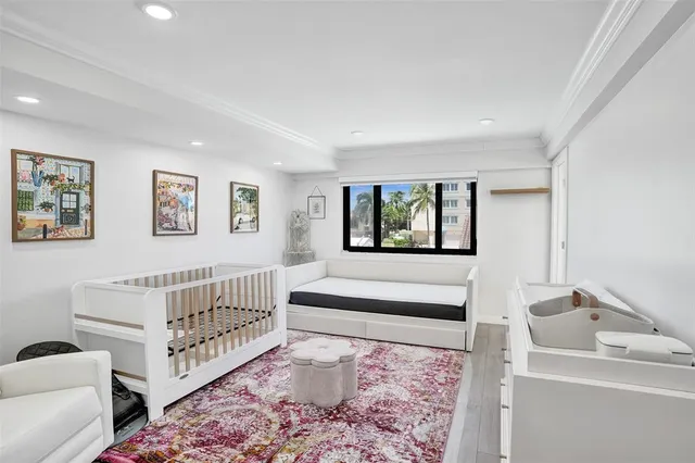 a bedroom with furniture and windows