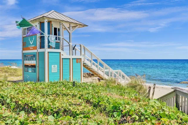 a view of a house with a ocean view
