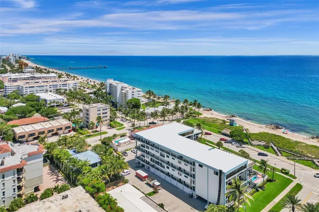 a view of a city with an ocean