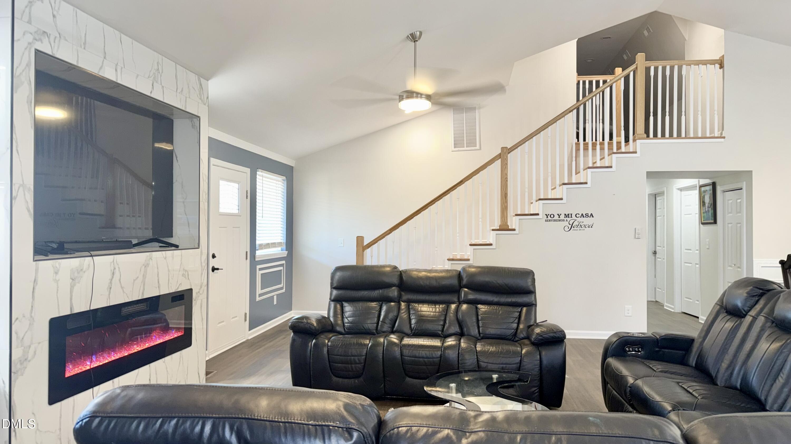 1696 James Winston Road Oxford, NC 27565 - Photo 11 of 19 a living room with furniture fireplace and a flat screen tv
