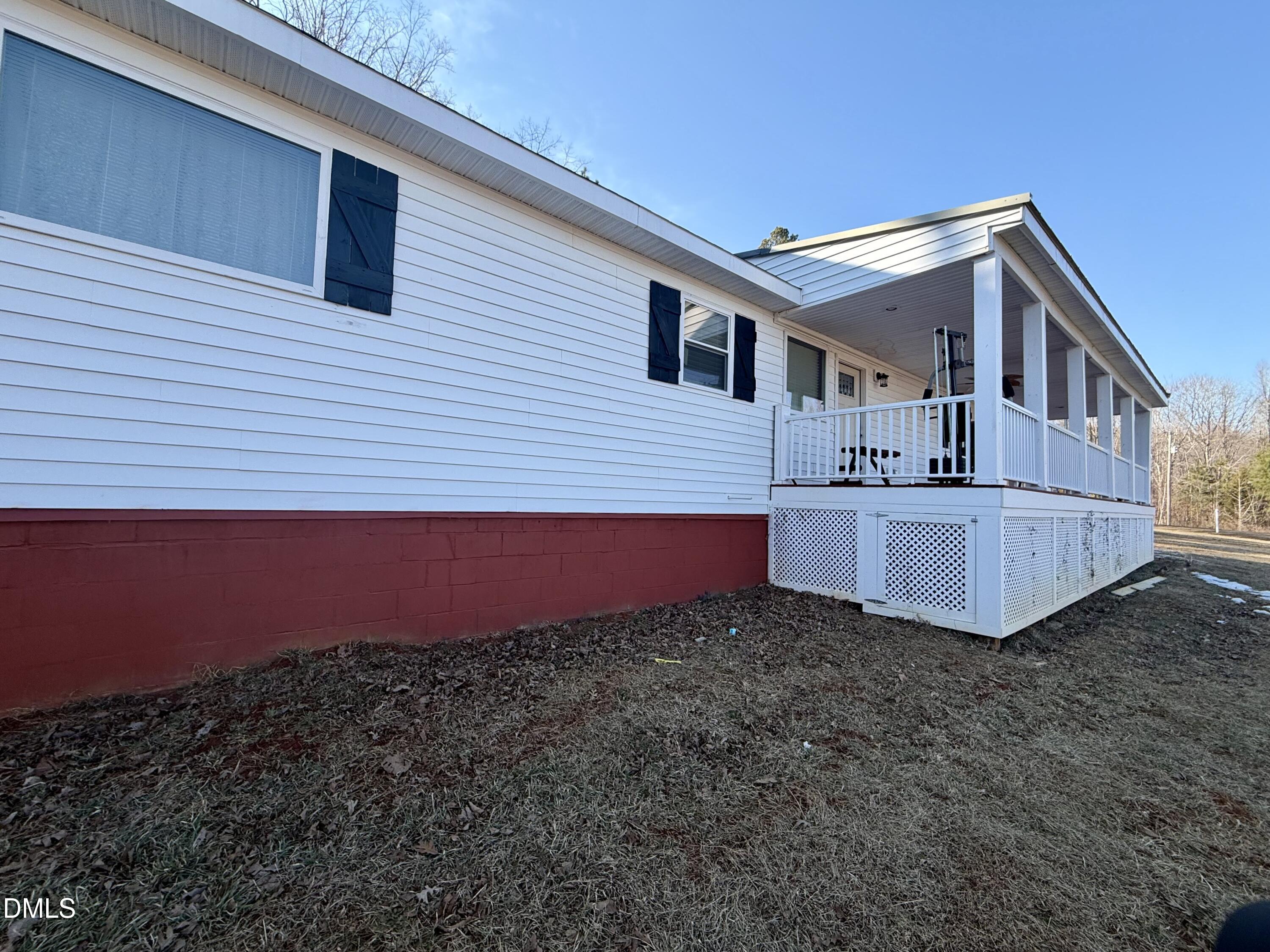 1696 James Winston Road Oxford, NC 27565 - Photo 13 of 19 a view of a house with a yard