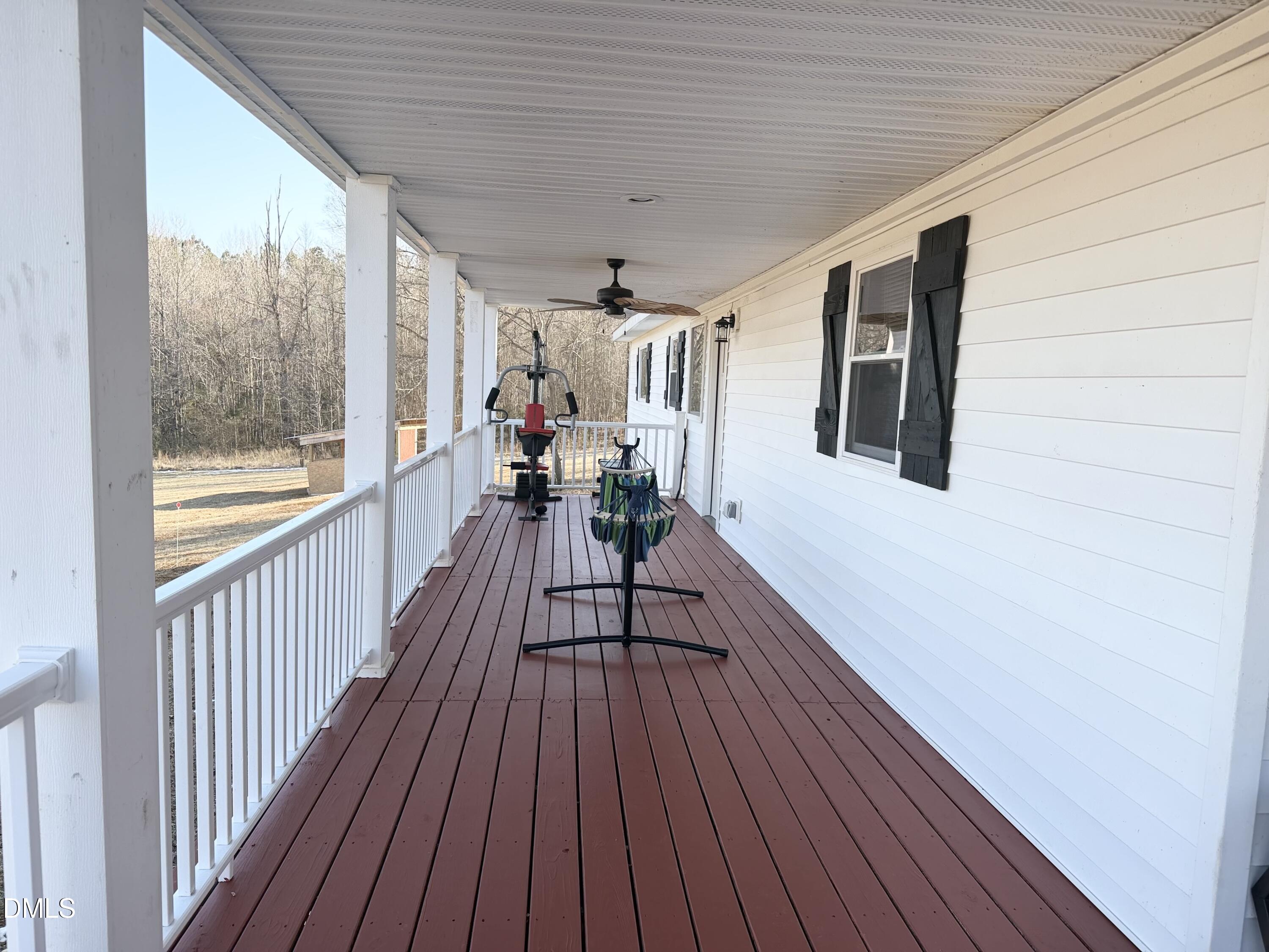 1696 James Winston Road Oxford, NC 27565 - Photo 14 of 19 a view of a house with wooden floor and furniture