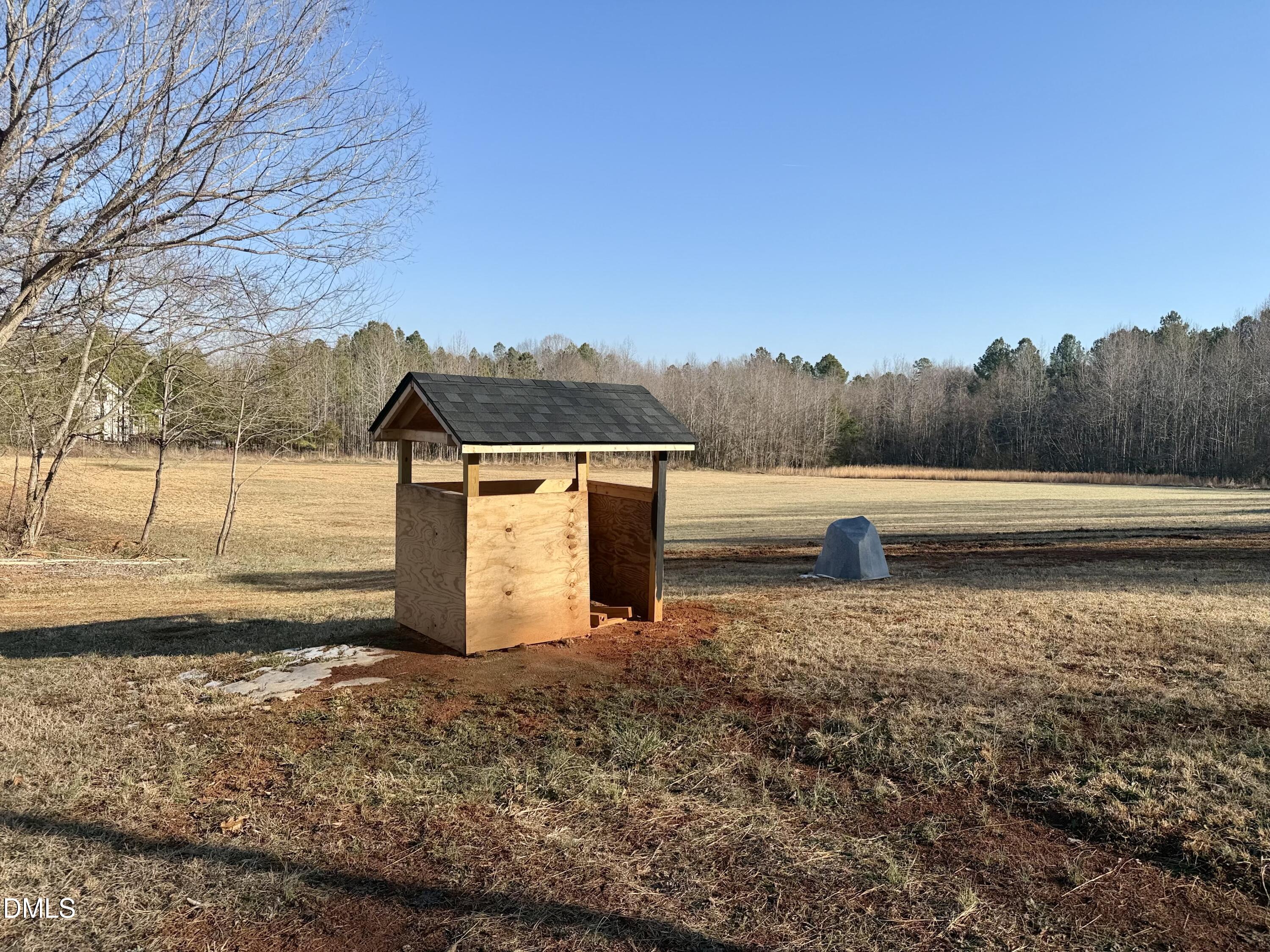 1696 James Winston Road Oxford, NC 27565 - Photo 5 of 19 a view of a yard with an ocean view