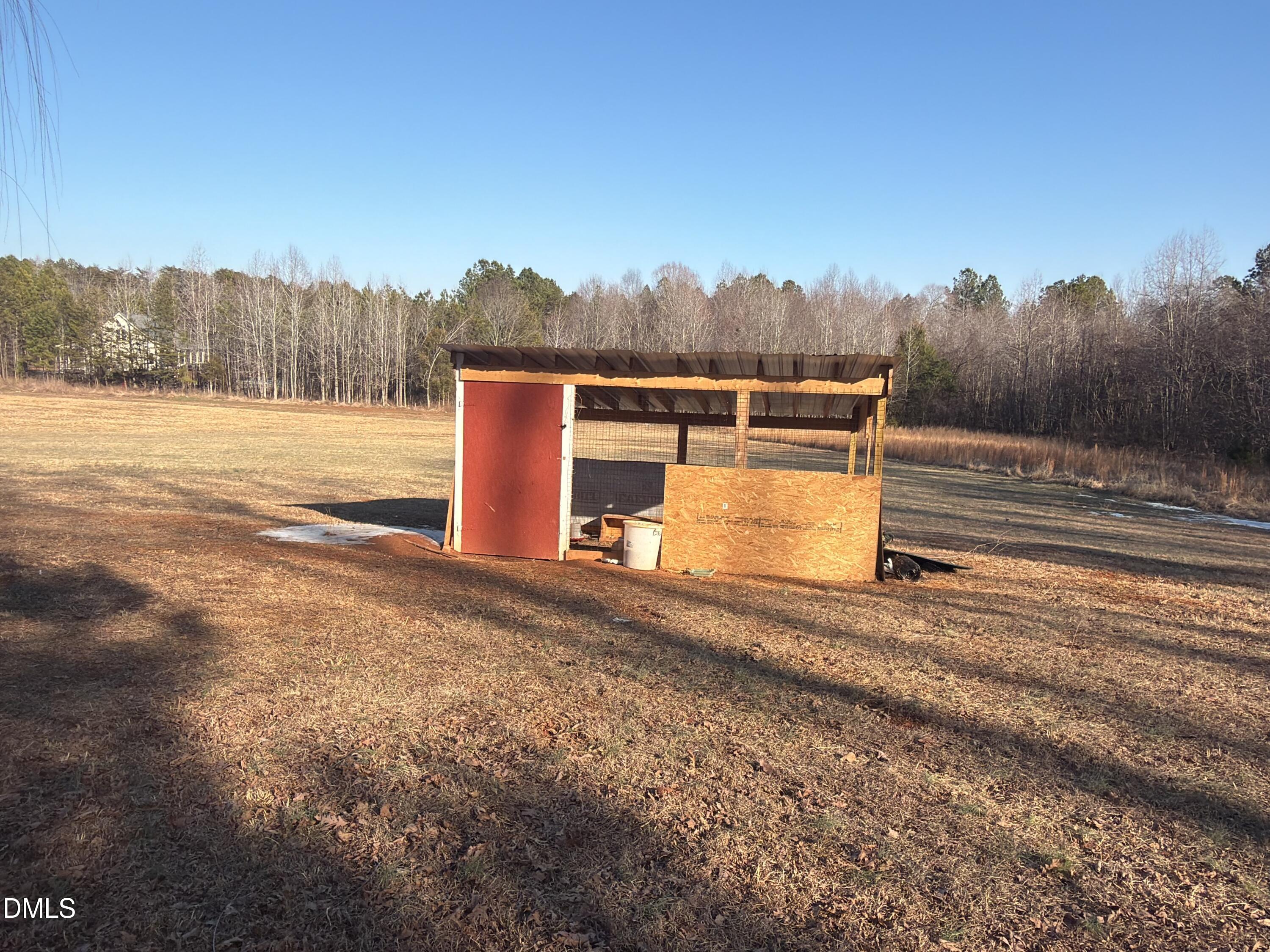 1696 James Winston Road Oxford, NC 27565 - Photo 6 of 19 a view of a backyard