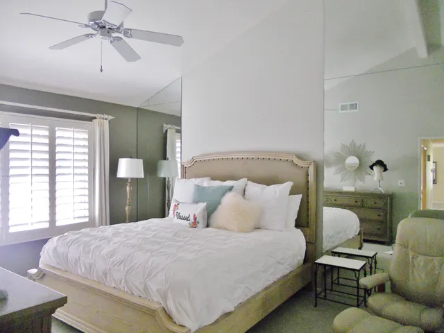 a bathroom with a shower and toilet