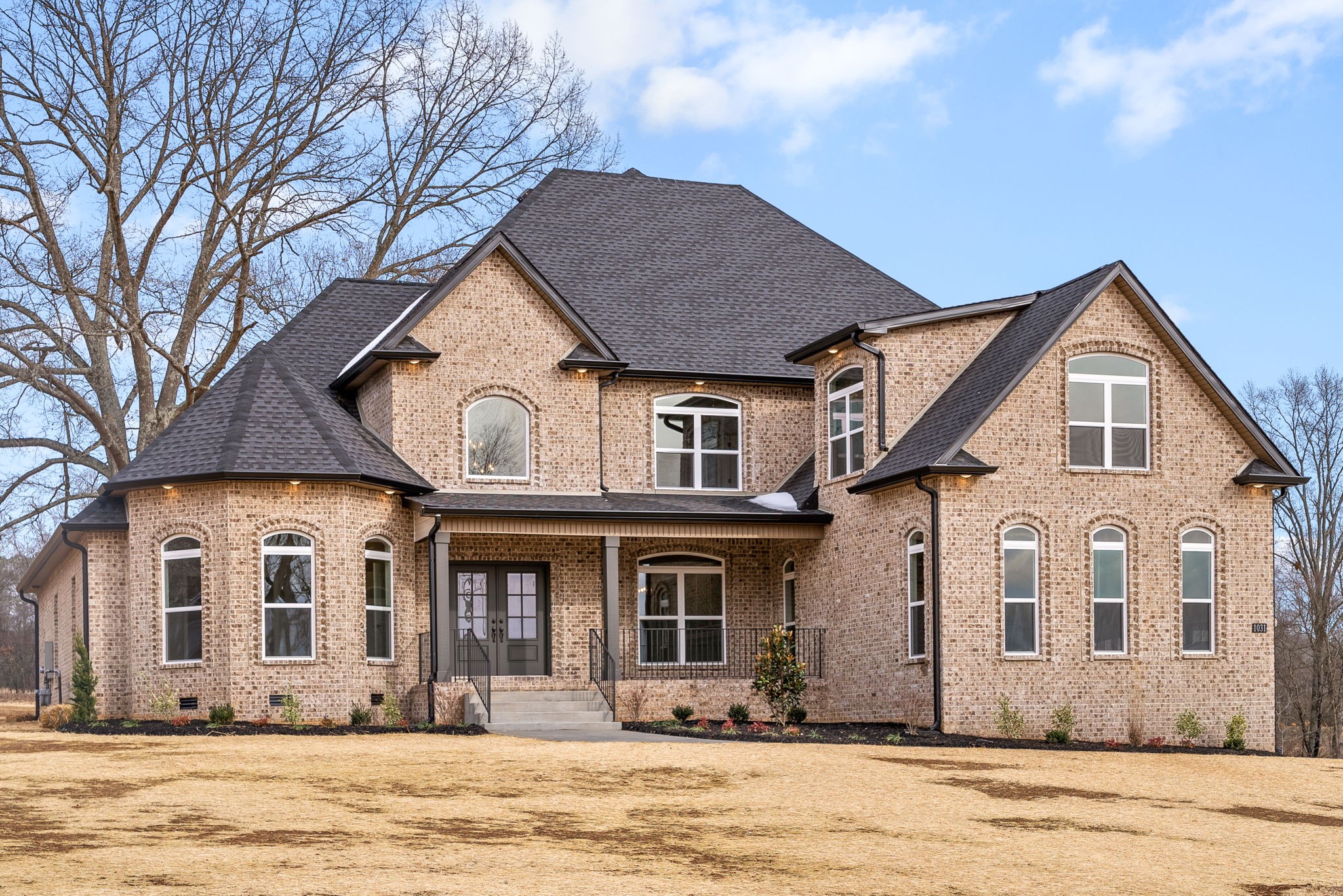 1031 Gratton Road Clarksville, TN 37043 - Photo 1 of 46 a front view of a house with a yard