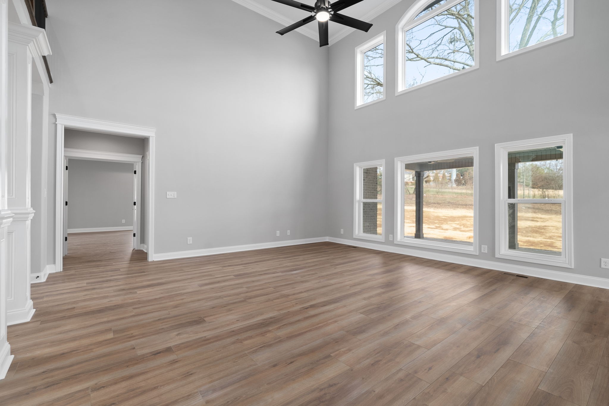 1031 Gratton Road Clarksville, TN 37043 - Photo 5 of 46 a view of a livingroom with wooden floor and a window
