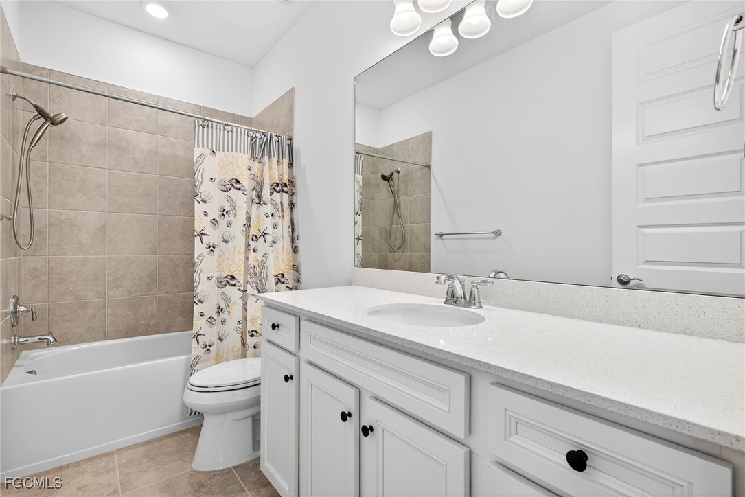 4351 Washington Place Ave Maria, FL 34142 - Photo 25 of 44 a bathroom with a sink a toilet and a bathtub