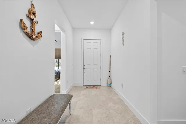 a view of a room with wooden floor and closet