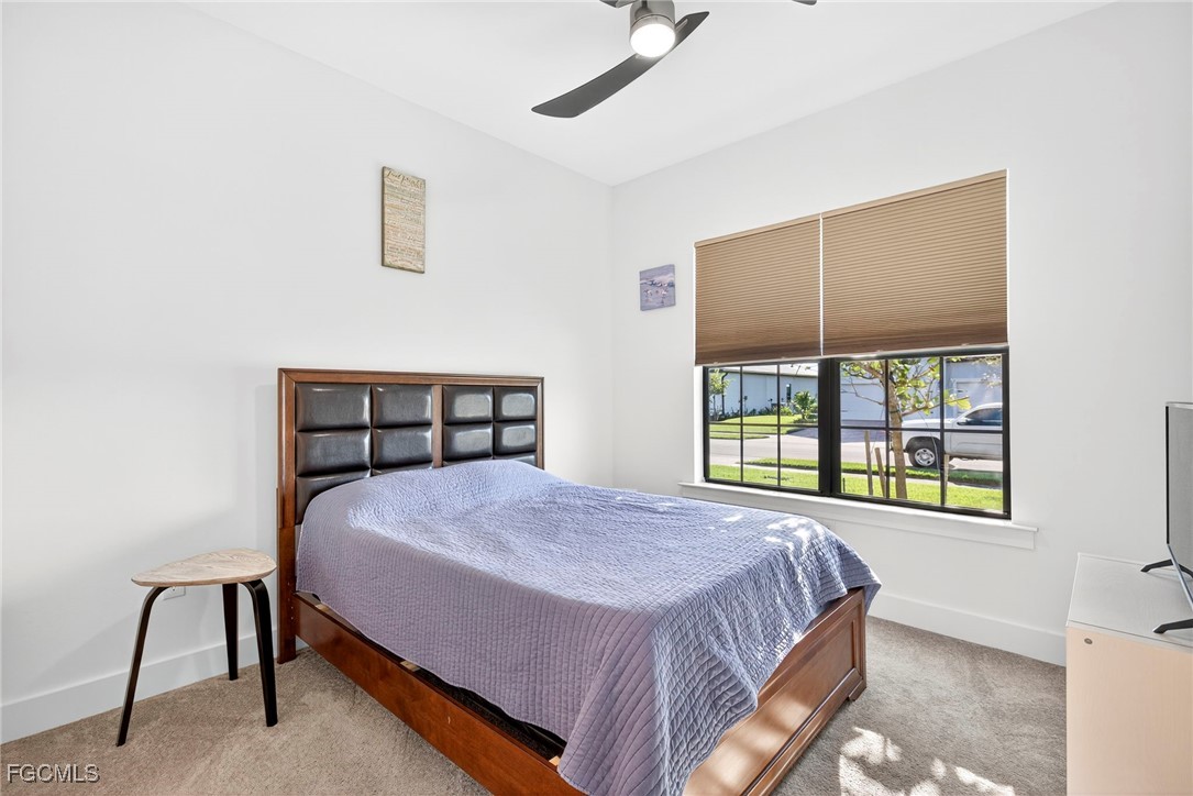 4351 Washington Place Ave Maria, FL 34142 - Photo 31 of 44 a bedroom with a bed and a window