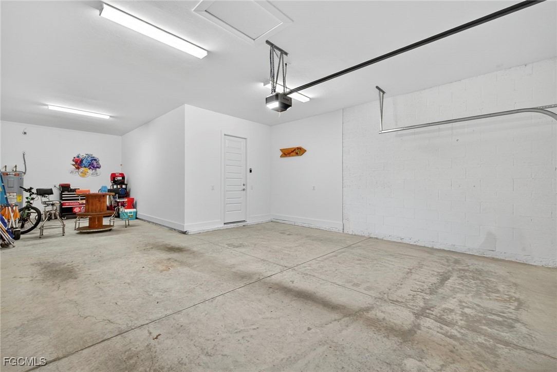 4351 Washington Place Ave Maria, FL 34142 - Photo 33 of 44 a view of a garage with a bike and garage