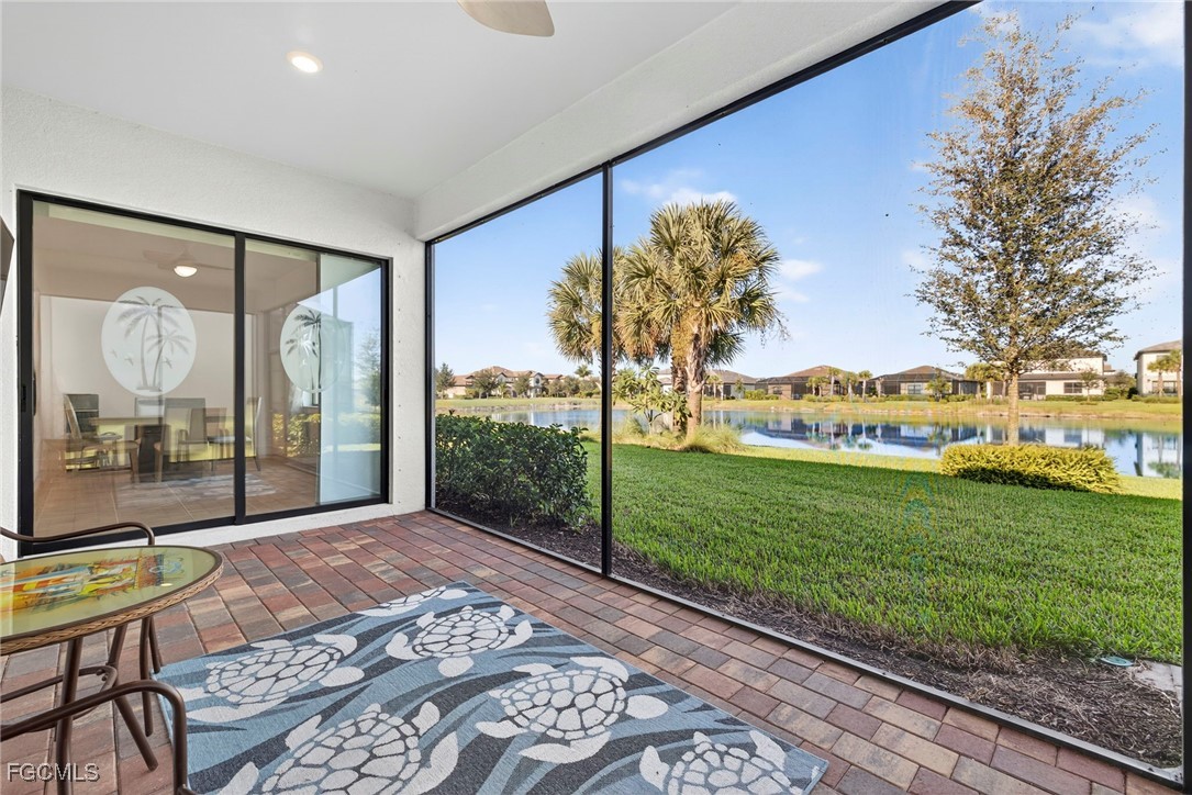 4351 Washington Place Ave Maria, FL 34142 - Photo 35 of 44 a view of a porch with a table and chairs