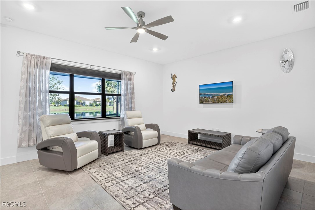 4351 Washington Place Ave Maria, FL 34142 - Photo 4 of 44 a living room with furniture and a window