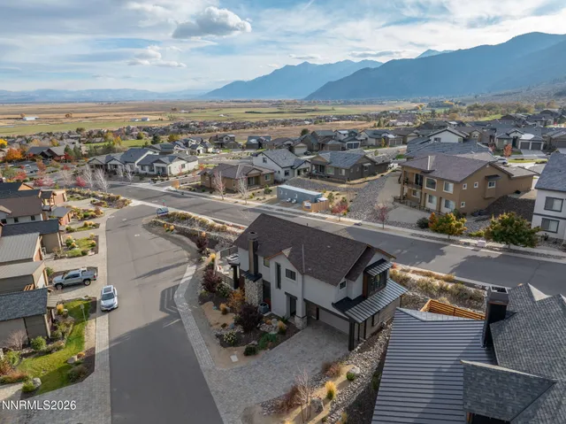 an aerial view of a house with a garden