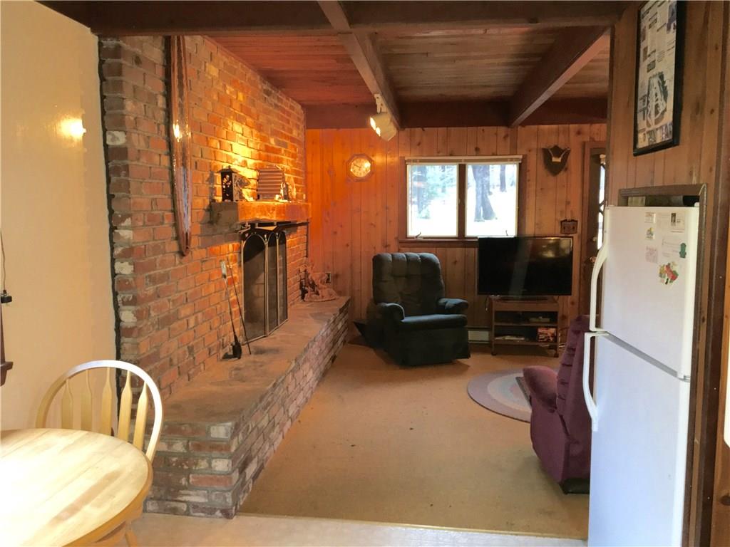 720 Alpine Road Boswell, PA 15531 - Photo 19 of 25 View from Kitchen into Livingroom and Fireplace!