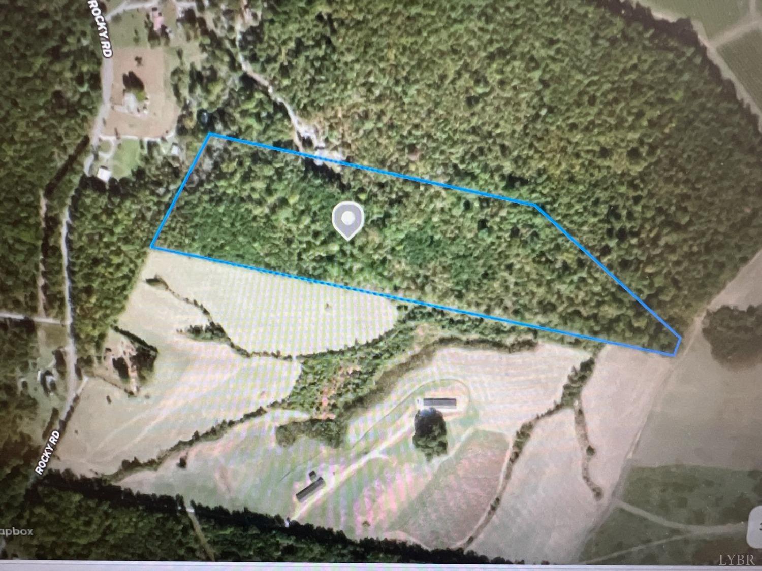 0 Rocky Road Rustburg, VA 24588 - Photo 5 of 5 an aerial view of a house with a yard and large trees