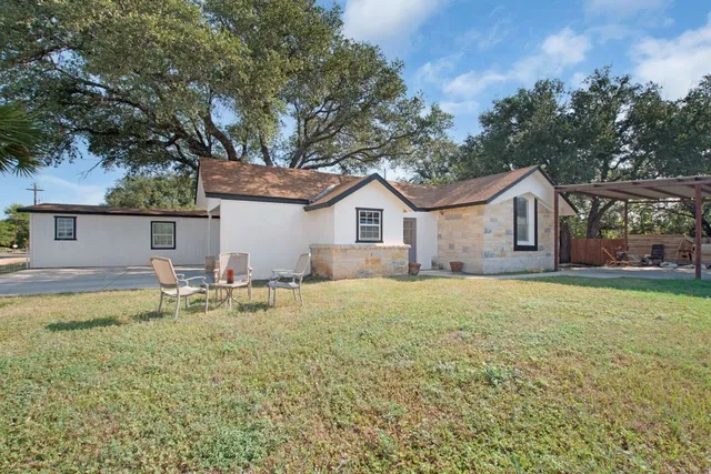 a house view with a outdoor space