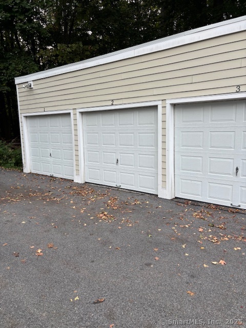 2 Casagmo Garage Street Ridgefield, CT 06877 - Photo 1 of 1 a front view of a house