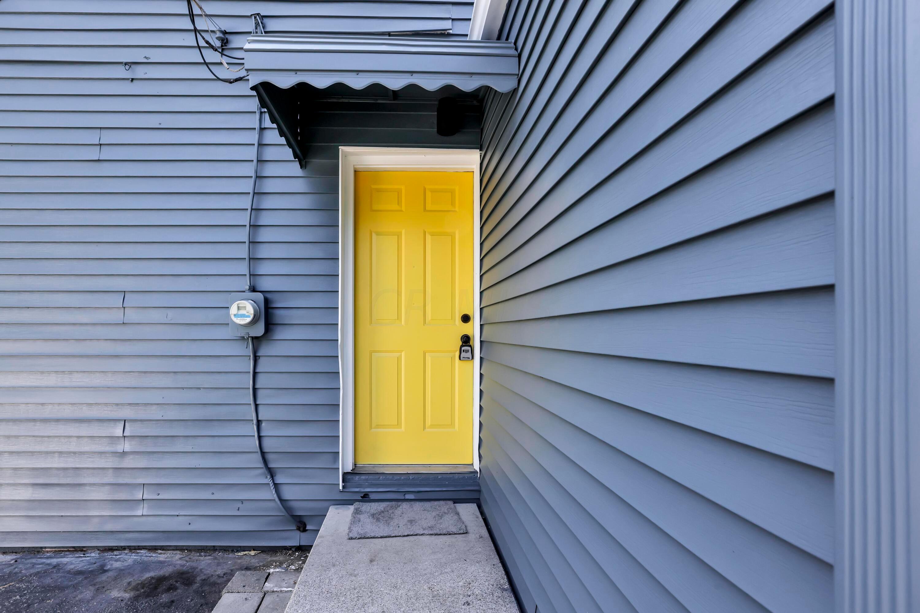 3375 Karl Road Columbus, OH 43224 - Photo 38 of 45 Back door - conveniently located next to the kitchen for when you bring out the meats to the grill