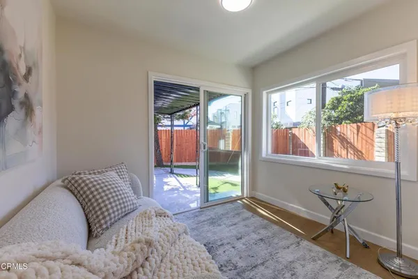 a kitchen with a sink cabinets and window
