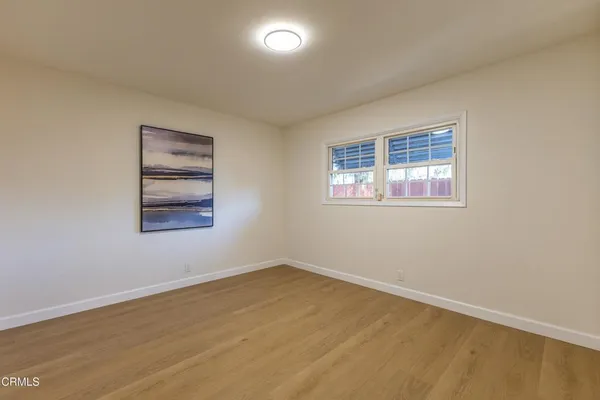 a view of an empty room and window