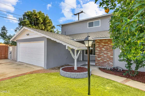 a front view of house with yard