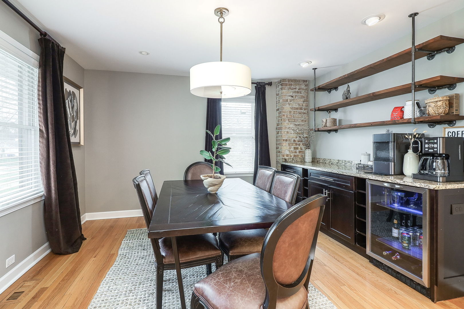 133 South Williston Street Wheaton, IL 60187 - Photo 15 of 43 a dining room with furniture window and wooden floor