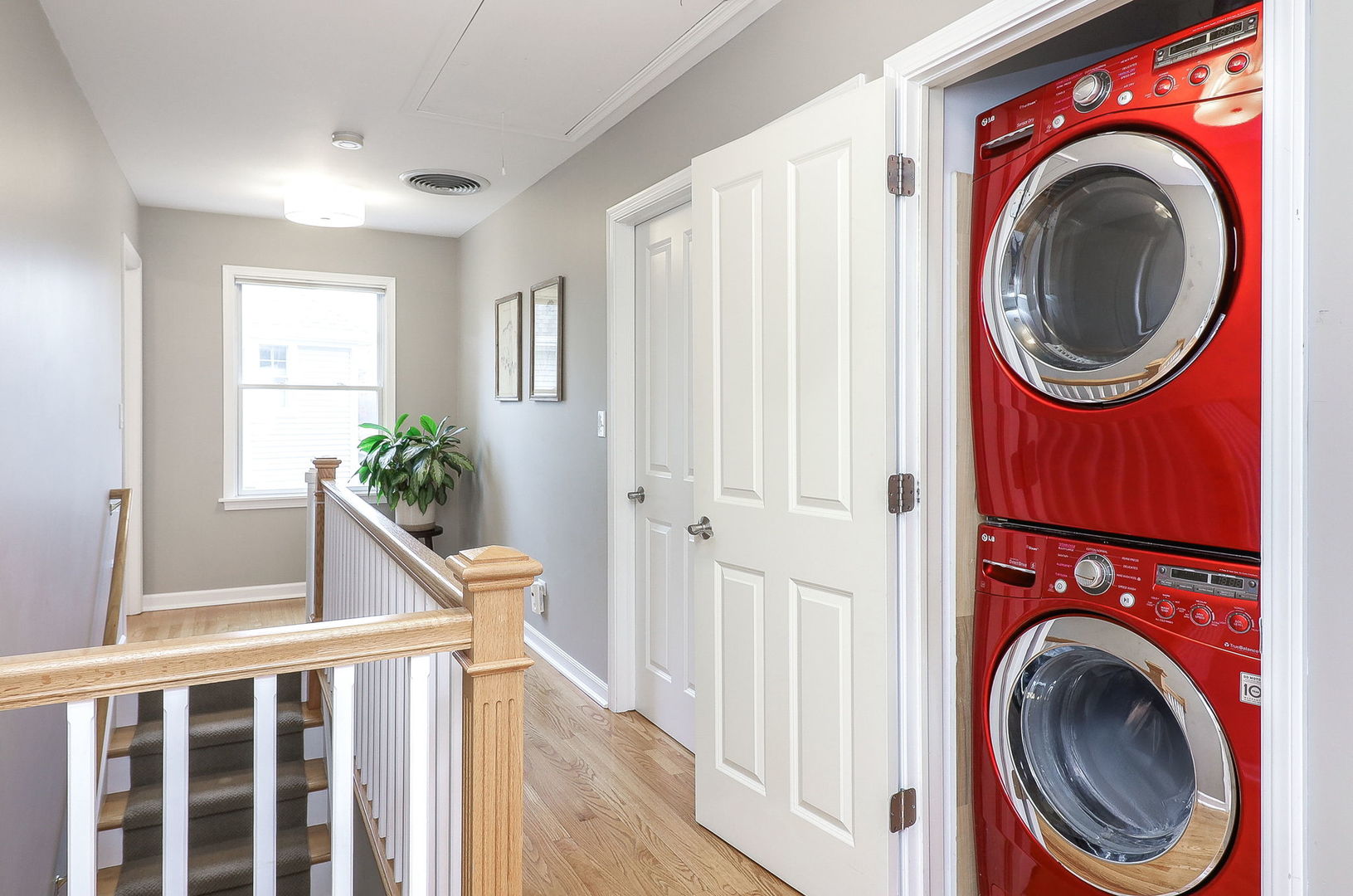 133 South Williston Street Wheaton, IL 60187 - Photo 22 of 43 a view of a hallway with washer and dryer