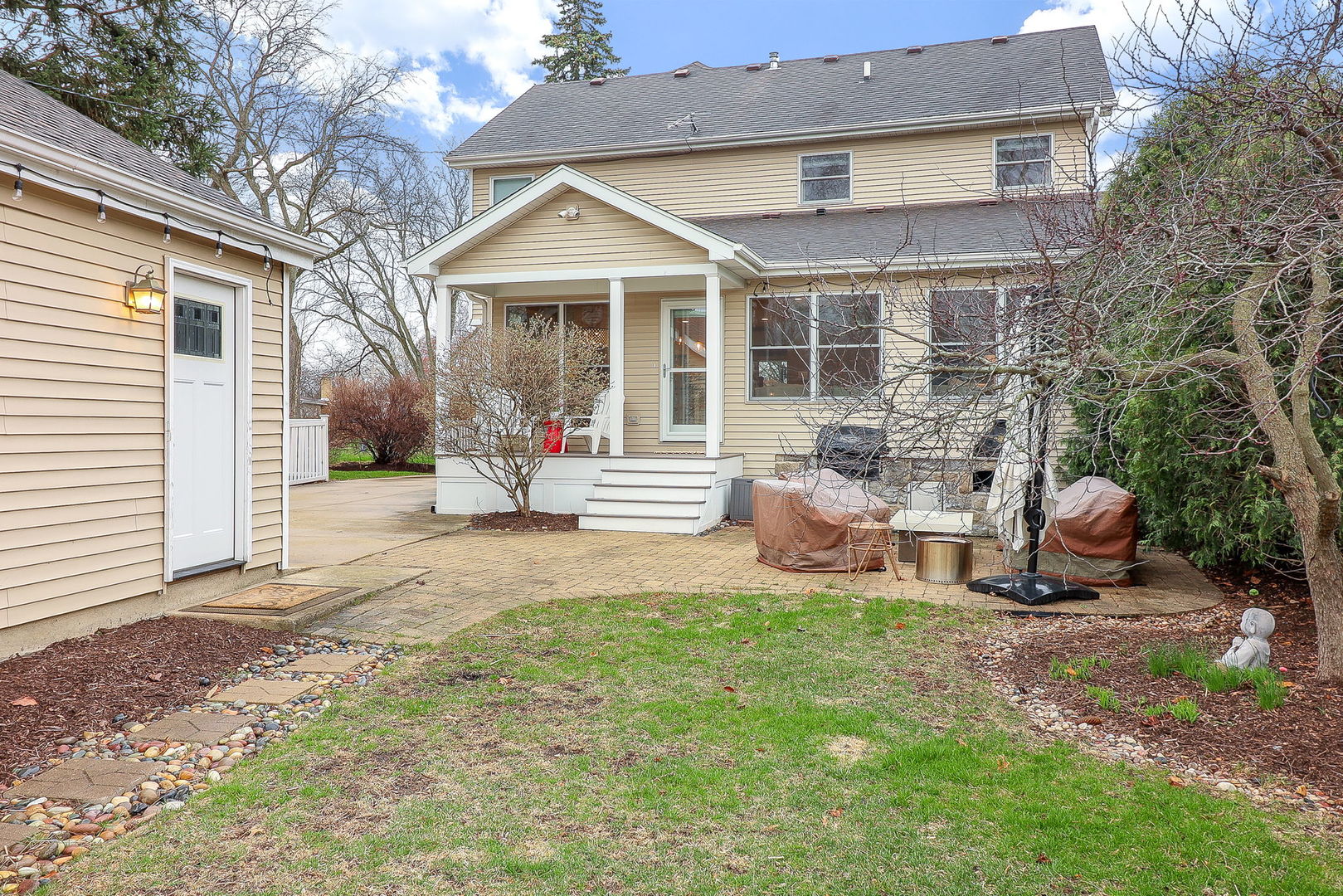 133 South Williston Street Wheaton, IL 60187 - Photo 26 of 43 a view of a house with backyard and sitting area